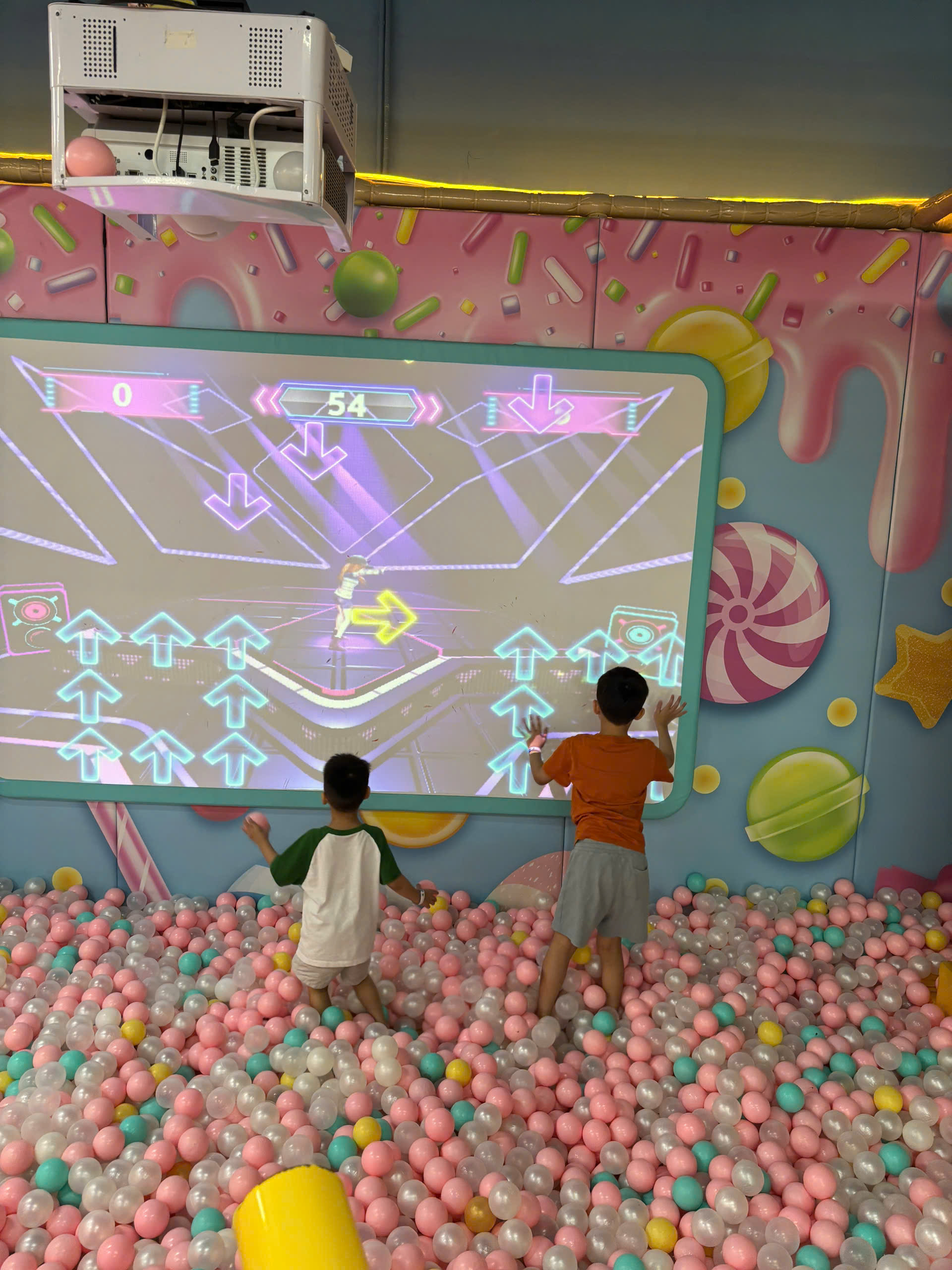 Happy family and children with English-speaking babysitter Anh Nguyen in Vietnam - A fun-filled day exploring the Giggle Beans Play Zone! Indoor playgrounds are perfect for building motor skills and making new friends in a safe environment. - Image 2